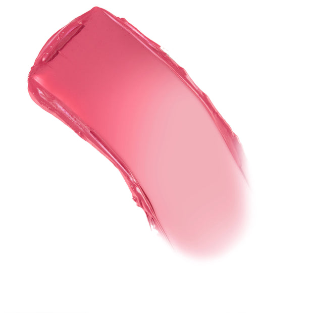 Adore You shade swatch of ColourPop Lip and Cheek Balm, a glossy rosy-pink swipe tapering from rich rose to soft blush, smeared to show creamy, sheer-to-buildable payoff on a clean white background.