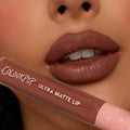 Full lips showcase Espresso Martini, a rich mocha-brown shade with a soft, diffused matte finish, while a ColourPop tube rests below; ColourPop Ultra Blotted Lip delivers lightweight, blurred color for everyday wear.