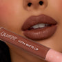 Full lips showcase Espresso Martini, a rich mocha-brown shade with a soft, diffused matte finish, while a ColourPop tube rests below; ColourPop Ultra Blotted Lip delivers lightweight, blurred color for everyday wear.