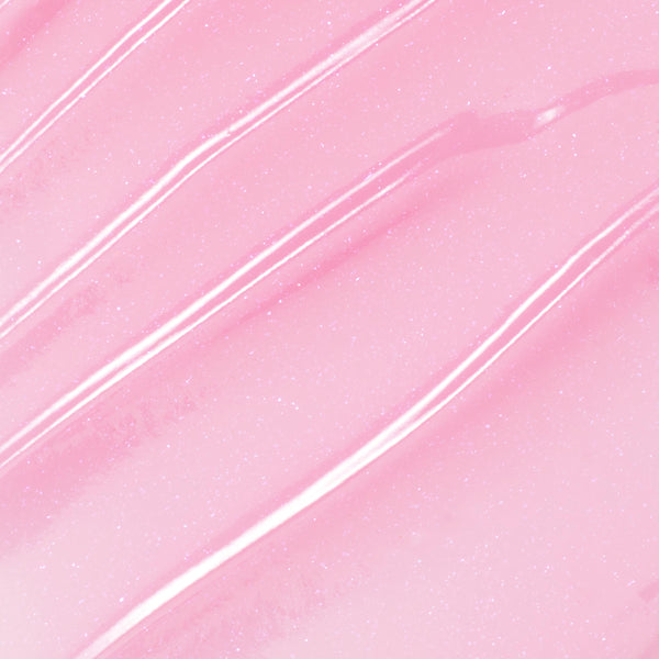 You're a Catch ColourPop Lip Mask swatch gliding in diagonal streaks, showing a sheer baby pink, glossy, micro-shimmer finish in a close-up texture shot.