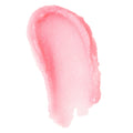 Shimmery pink sugar lip scrub swatched in a thick oval smear on a white background, highlighting fine exfoliating crystals and a balm-like sheen; ColourPop lip care swatch for gentle lip exfoliation and smoothing.
