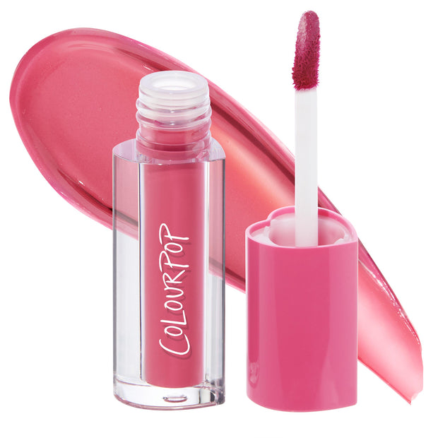 ColourPop Lip Stain Mantra stands open, doe-foot applicator coated in rosy pink pigment, with a glossy swatch behind; clear acrylic tube with white ColourPop logo and pink cap showcases the liquid lip stain shade.