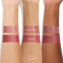 Ravished Lip and Cheek Balm swatched in wide bands on three arms of light, medium, and deep skin tones, showing a glossy berry-rose pigment beneath a lighter Love Interest swatch; creamy, buildable ColourPop Lip and Cheek Balm finish.