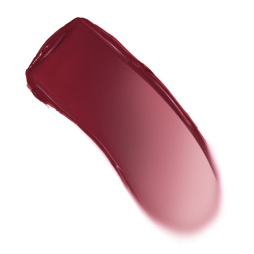 Creamy swatch arcs across a white background, showing a deep berry-wine to soft rose gradient with a dewy sheen - ColourPop Lip and Cheek Balm in Ravished, highlighting buildable pigment for lips and cheeks.