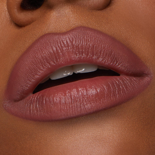Full lips lined and filled with ColourPop Lippie Pencil in Double Tap, showing a soft-matte rose mauve finish with precise edges; close-up beauty swatch highlighting creamy pigment and smooth texture.