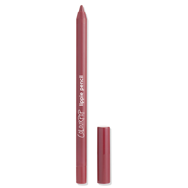 ColourPop Lippie Pencil in Me Again stands upright with cap removed, revealing a rosy mauve lip liner tip; slim pencil labeled “ColourPop lippie pencil,” shown against a clean white studio background.