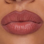 Full lips lined and filled with ColourPop Lippie Pencil in Double Tap, showing a smooth, rosy-mauve hue with defined edges and a soft satin finish in a studio close-up, highlighting precise application for everyday wear.