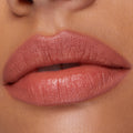Lips lined and filled with Five Stars ColourPop Lippie Pencil lip liner, a warm pink‑nude shade, showing smooth satin payoff in a close-up beauty swatch of the mouth area.