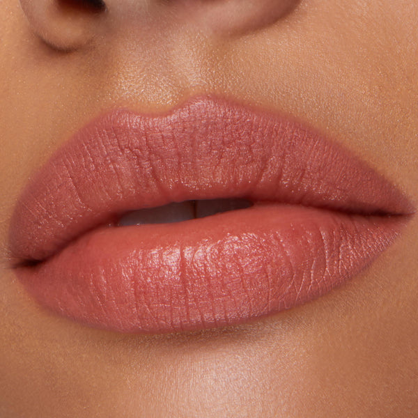 Lips lined and filled with Five Stars ColourPop Lippie Pencil lip liner, a warm pink‑nude shade, showing smooth satin payoff in a close-up beauty swatch of the mouth area.