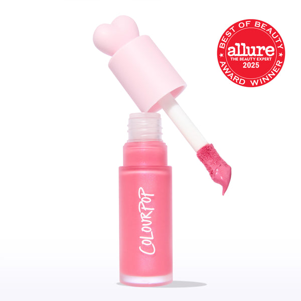 ColourPop Liquid Blush Princess Ave displays a frosted pink tube with COLOURPOP logo as the doe-foot applicator lifts a creamy rosy-pink swipe, topped by a heart-shaped cap, with a 2025 Allure Best of Beauty award badge on a white backdrop.