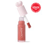 ColourPop Liquid Blush in THX shown open as the doe-foot applicator lifts a rosy peach tint from a frosted bottle with a pink heart cap, COLOURPOP logo visible, on white background with Allure Best of Beauty 2025 award badge.