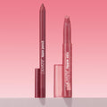 ColourPop Lippie Pencil Shot Clock stands uncapped beside matching Lippie Stix, both in rosy mauve, upright on a light surface against a pink gradient backdrop, highlighting the precise liner tip and branded tubes.