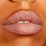Lips wearing ColourPop Lippie Pencil Cool BFF, outlining and filling a cool nude mauve shade with a soft matte finish, shown in an extreme close-up beauty swatch for precise lip definition.