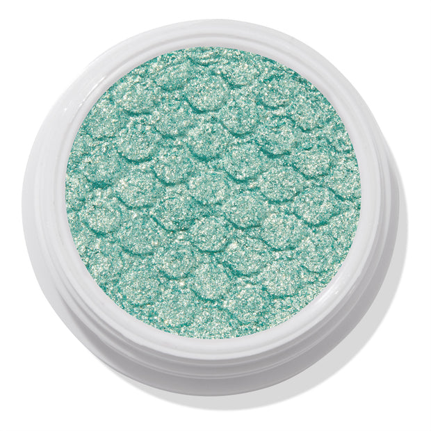 ColourPop Super Shock Shadow Mint 4 U shimmering mint green eyeshadow glistening in a white pot, showcasing metallic sparkle and the brand's bouncy, scale-embossed texture for creamy, long-wear payoff on lids or inner-corner highlight.