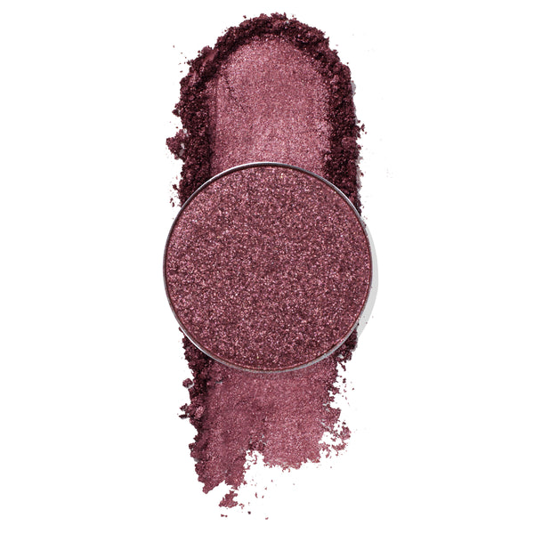Miss U ColourPop Pressed Powder Shadow, a shimmery mauve‑plum single, shown in a round pan with crushed pigment and a bold swipe swatch, highlighting metallic sparkle and rich payoff on a white background.