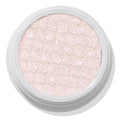 Colourpop Mountain Lion Super Shock Shadow, a pale icy pink shimmer eyeshadow with a metallic, glittery finish and signature bouncy, honeycomb texture in a round white single-pan pot on a white background.