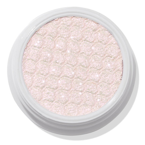 Colourpop Mountain Lion Super Shock Shadow, a pale icy pink shimmer eyeshadow with a metallic, glittery finish and signature bouncy, honeycomb texture in a round white single-pan pot on a white background.