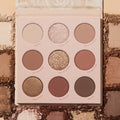 Nude Mood ColourPop Shadow Palette displaying nine neutral eyeshadows - matte and shimmer - labeled Bluffin', Wink Wink, Bare to Wear, Au Naturale, Put On Heirs, Mugged Off, Lap of Lux, The Cocoa, and Moody, set on crushed nude swatches.