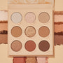 ColourPop Blushing Nude shadow palette set opens to nine neutral pans - matte and shimmer shades like Bluffin’, Wink Wink, and The Cocoa - shown with coordinating swatches surrounding the compact in warm beige, rose, and cocoa tones.
