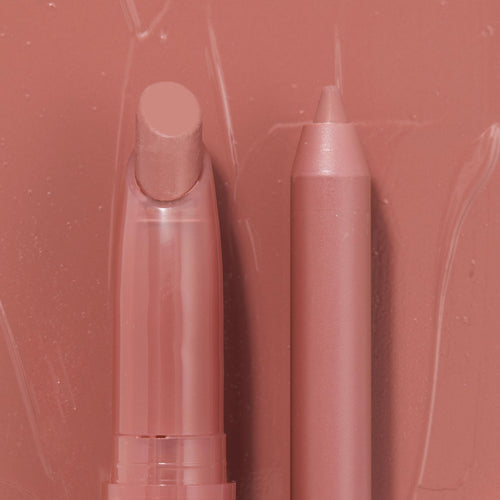 Double the Trouble ColourPop Lippie Stix + Pencil Set shown side by side in a warm rosy nude; the twist-up Lippie Stix and matching precision pencil rest on a glossy pink swatched backdrop, highlighting the coordinated shade for lining and filling lips.
