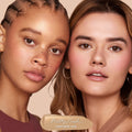 ColourPop Pretty Fresh Creamy Concealer in Fair 15 W brightening under eyes on two models, showcasing hydrated natural coverage; close-up studio shot on a nude backdrop with a creamy beige swatch labeled Pretty Fresh at the bottom.