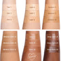 ColourPop Pretty Fresh Tinted Foundation Balm in Fair 4 swatched on a forearm beneath Fair 1 and Fair 3, shown with adjacent arms displaying labeled shades from Light to Deep Dark for side-by-side tone comparison.