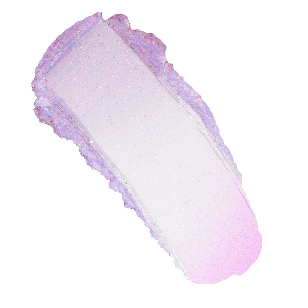 Shimmering clear-to-pink swatch of Transform pH Lip Balm, a color-changing balm with iridescent microglitter, shown as a smooth smear on a white background for texture detail; ColourPop pH Lip Balm.