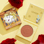 ColourPop Pressed Powder Blush Chip opens to reveal a rose-embossed pan, with Disney Beauty and the Beast Chip artwork on the compact and box, styled flat on a pale yellow background with scattered red roses.