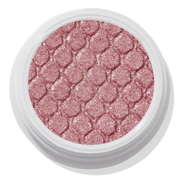 ColourPop Party of Five Super Shock Shadow glistens in a round white pot, a shimmering rose-pink single eyeshadow with fine silver sparkle and a quilted pressed texture, shown in a close-up top view.