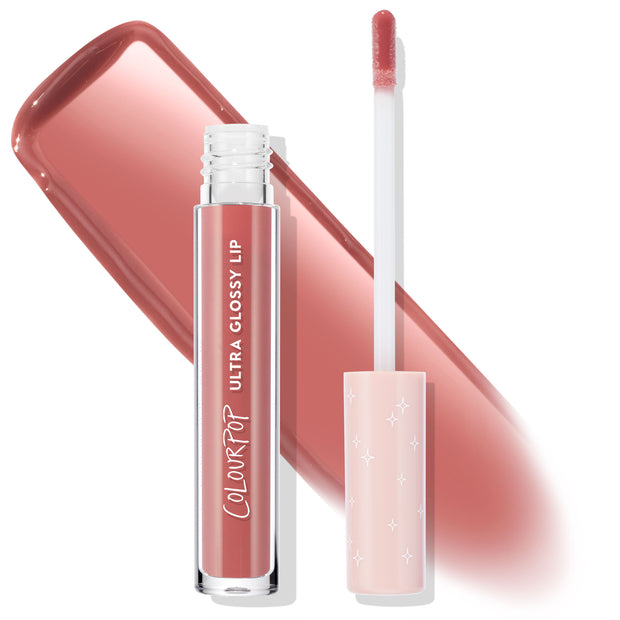 Pasadena ColourPop Ultra Glossy Lip shown opened, with clear tube and doe-foot applicator coated in rosy mauve gloss, a high-shine swatch streaked behind; pale pink cap with white stars on a clean white background.