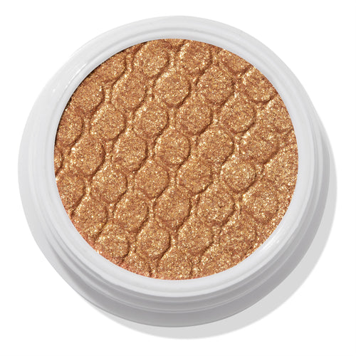 Golden bronze Pledge Class ColourPop Super Shock Shadow shimmers with metallic sparkle in a quilted, scale-textured pan, housed in a round white pot on a clean white background.