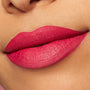 Lips wearing ColourPop Lippie Pencil in I Heart This, lined and filled in a bold fuchsia pink, showcasing a smooth, creamy matte finish in a close-up lip swatch.