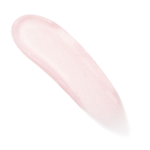 Pale pink, translucent swatch of Pure Madness ColourPop Lip Mask arced in a smooth swipe, showing glossy, gel-like texture with fine shimmer on a clean white background.