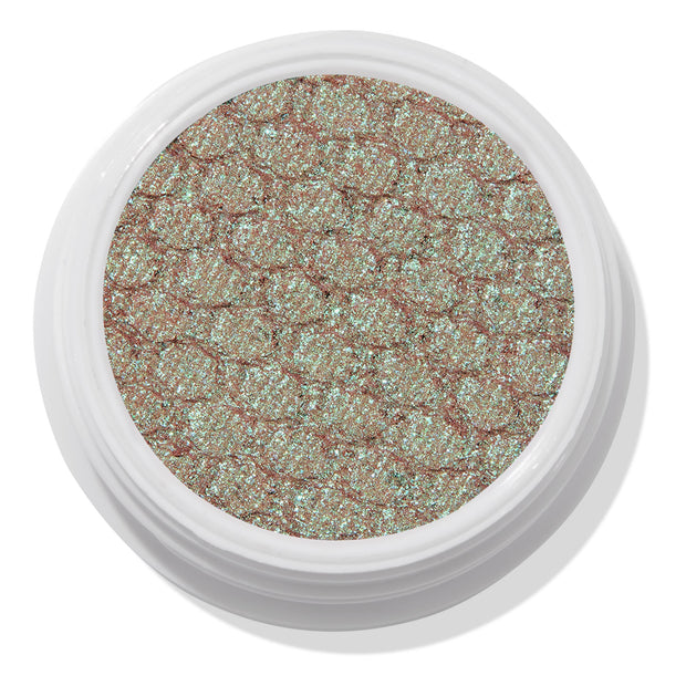 Rooftop Cocktails ColourPop Super Shock Shadow, a shimmery duochrome eyeshadow with mint-teal glitter over a warm rose base, shown top-down in an open white pot with the quilted imprint visible on a white background.