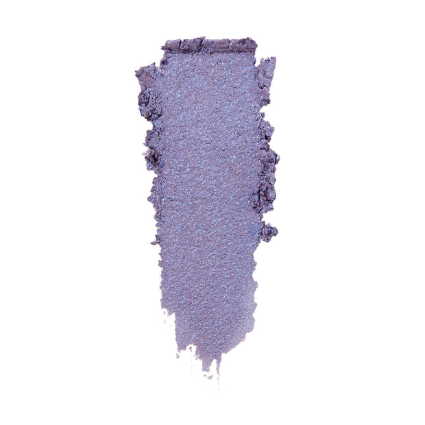 Rose Garden ColourPop Super Shock Shadow swatched in a single wide smear, a cool-toned lavender purple with icy blue sparkle and metallic sheen, showing soft, blendable texture on a white background.