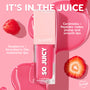 ColourPop So Juicy Plumping Glossy Lip Oil in shade Trending Now stands upright, visibly plumping and smoothing lips with ceramides and peptides; raspberry and strawberry oils moisturize amid pink gloss spills, raspberries, and a strawberry slice.