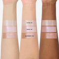 Three forearms display Sweet Sips Super Shock Shadow full collection set swatches—shades Extra Ice, Sweet Sip, and Raspberry Fizz—showing shimmery champagne and pink tones on light, medium, and deep skin for US makeup lovers.