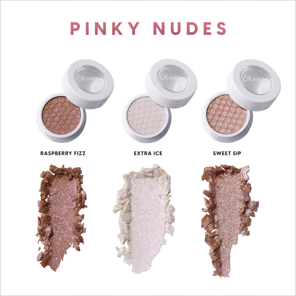 Coconut Cream and Soda Super Shock Shadow trio displayed in white round pots with lids open, showing shimmery pinky nude shades and crushed swatches beneath each color on a clean white background, labeled Raspberry Fizz, Extra Ice, and Sweet Sip.