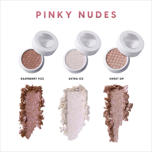 Coconut Cream and Soda Super Shock Shadow trio displayed in white round pots with lids open, showing shimmery pinky nude shades and crushed swatches beneath each color on a clean white background, labeled Raspberry Fizz, Extra Ice, and Sweet Sip.