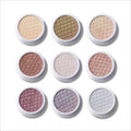 Sweet Sips Full Collection Set Super Shock Shadow compacts arranged in a 3x3 grid, showcasing nine shimmery honeycomb-pressed eyeshadows in champagne, bronze, taupe, mauve, and icy silver tones on a clean white background.