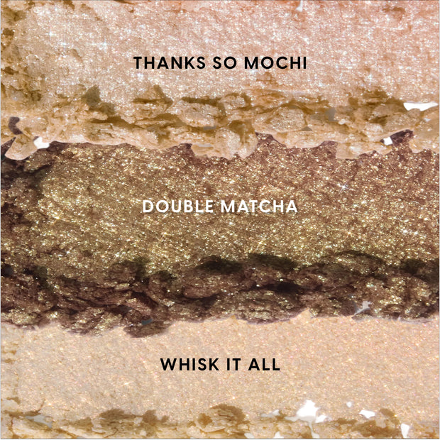 Crushed ColourPop Matcha and Mochi Super Shock Shadow swatches in three shimmery shades—champagne Thanks So Mochi, golden olive Double Matcha, and pale peach Whisk It All—layered horizontally on a textured background for US makeup lovers.