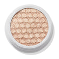 ColourPop Sailor Super Shock Shadow glitters in a close-up, a champagne-beige cream eyeshadow with a honeycomb quilted texture, seated in a white round pot on a clean white background, showcasing its metallic shimmer finish.