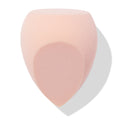 Blush-pink Sculpting Sponge blending foundation and contour with a flat top, rounded sides, and a pointed precision tip, shown angled on a white backdrop with soft shadow; ColourPop Makeup Tools & Accessories for seamless application.