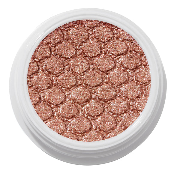 ColourPop Sequin Super Shock Shadow shimmers in metallic copper rose-gold as it catches light, pressed with a scale-embossed texture in a white round pot, shown in a clean studio overhead close-up.