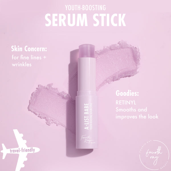 A-List Babe youth-boosting serum stick gliding open on a pastel pink smear, showing a twist-up solid serum; targeted for fine lines and wrinkles with retinyl; a travel-friendly ColourPop Serum Stick by Fourth Ray Beauty on a soft pink backdrop.