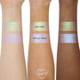 ColourPop Shadow Stix Cute and Feisty swatched on three arms - two bands per arm labeled Alien Vibes (gold‑green shimmer) and He’s All Yours (pink‑lilac blue shift) - showing creamy payoff across light, medium, and deep skin tones.