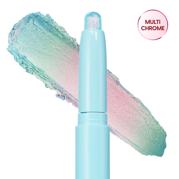 Colourpop Game Over Shadow Stix shown uncapped with a shimmering pastel blue, pink, and green duochrome eyeshadow swatch smeared behind the light blue crayon tube on a white background.