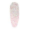 ColourPop Glitter Gel So Cute swatch sparkling with dense iridescent hex and microglitter in a clear pink-lavender gel, shown as a single smooth swipe on a white background to show texture and payoff.