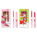 Pouty Grinch lip set from the ColourPop x The Grinch collabs, showing two pink-and-red plumping glossy balms with matching liners in illustrated holiday boxes featuring Cindy Lou and the Grinch on a white backdrop.
