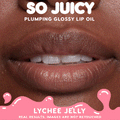 Glossy lips wear ColourPop So Juicy Plumping Glossy Lip Oil in Flirty Text, showcasing a high-shine, plumped finish; extreme close-up of the mouth highlights smooth texture and natural, non-retouched results.